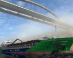 A Norwegian cargo ship grounds under the Svinesund Bridge, which connects Norway and Sweden.