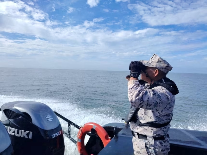 Hundreds missing after migrant boat sinks off Malaysia