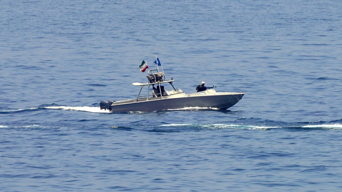 A U.S.-flagged tanker was challenged by Iranian gunboats